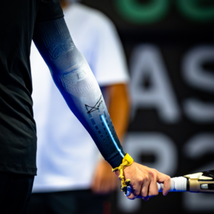Close-up of Agustín Tapia wearing the NO STRAIN Evolution biomechanical sleeve
